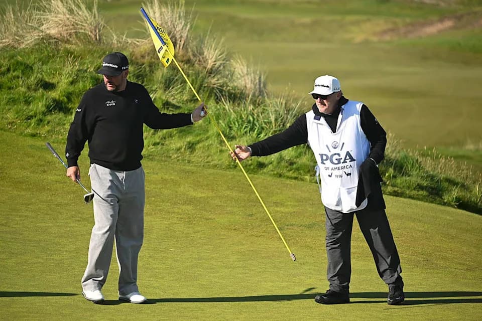 Michael Block and his caddie on the first green during the final round of the 2026 PGA Professional Championship at Bandon Dunes.