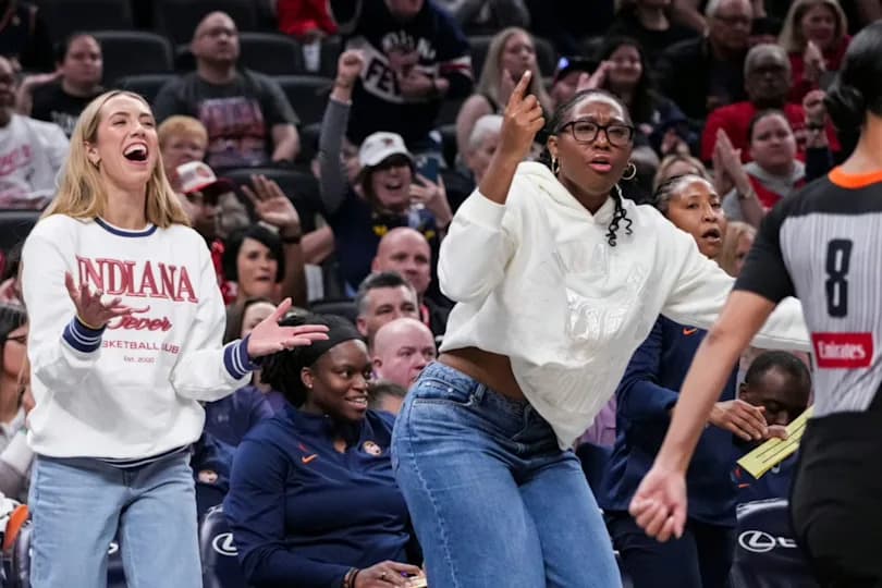 Indiana Fever guard Lexie Hull (10) and Indiana Fever forward Aliyah Boston (7) react from the bench Thursday, April 30, 2026, during the first half of a preseason game between the Indiana Fever and the Dallas Wings at Gainbridge Fieldhouse in Indianapolis.