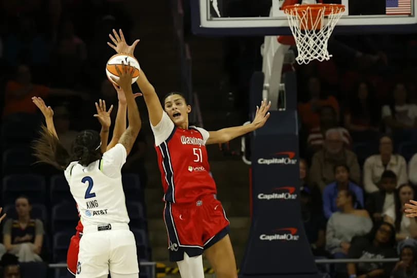 Apr 25, 2026; Washington, DC, USA; Washington Mystics center Lauren Betts (51) blocks the shot of Minnesota Lynx forward Liatu King (2) in the first half at Entertainment & Sports Arena. Mandatory Credit: Geoff Burke-Imagn Images