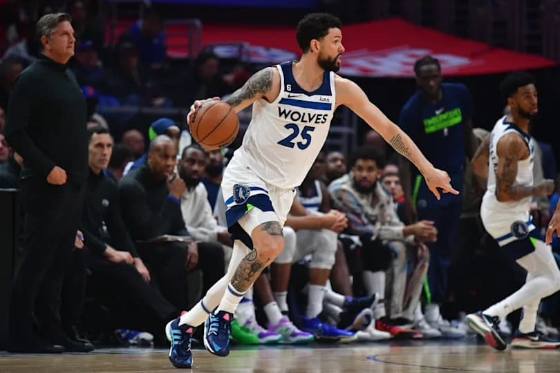 Feb 28, 2023; Los Angeles, California, USA; Minnesota Timberwolves guard Austin Rivers (25) controls the ball against the Los Angeles Clippers during the first half at Crypto.com Arena. Mandatory Credit: Gary A. Vasquez-USA TODAY Sports
