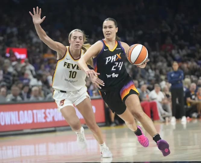 Phoenix Mercury forward Kathryn Westbeld (24) drives to the basket against Indiana Fever guard Lexie Hull (10) during the second quarter at PHX Arena on Sept. 2, 2025.