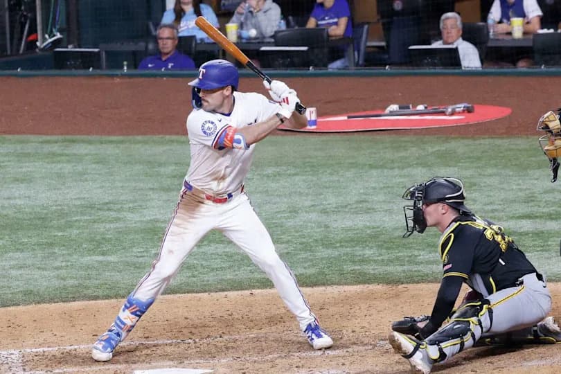 Texas Rangers center fielder Evan Carter (32) is ready to swing during the seventh inning of a baseball game against the Pittsburgh Pirates at Globe Life Field, Wednesday, April 22, 2026, in Arlington. (Chitose Suzuki/The Dallas Morning News)