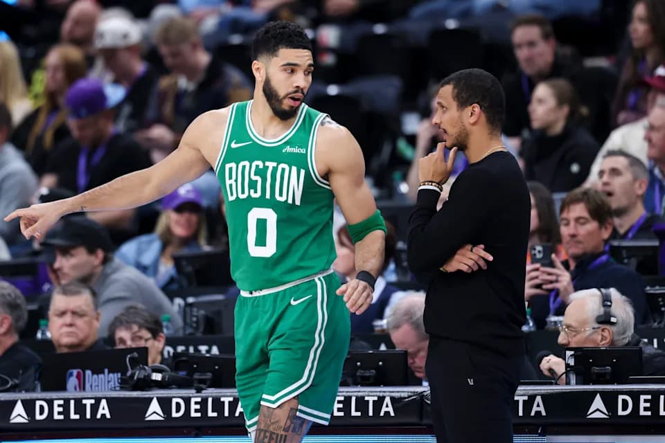 Mar 21, 2025; Salt Lake City, Utah, USA; Boston Celtics forward Jayson Tatum (0) and head coach Joe Mazzulla discuss a play against the Utah Jazz during the second half at Delta Center. Mandatory Credit: Rob Gray-Imagn Images