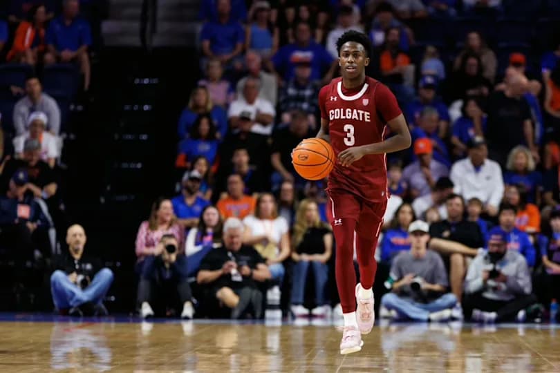Colgate Raiders guard Jalen Cox (3) dribbles the ball against the Florida Gators during the first half at Exactech Arena at the Stephen C. O'Connell Center.