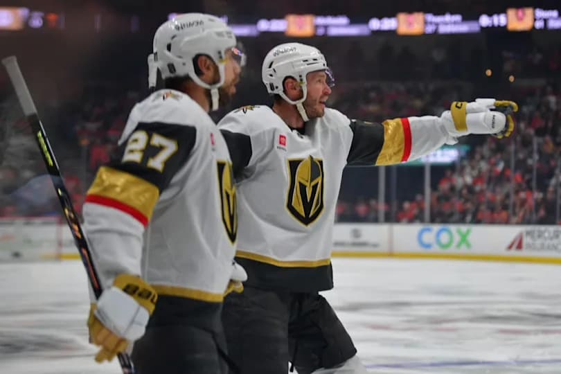 Vegas Golden Knights defenseman Shea Theodore (27) celebrates his goal with defenseman Brayden McNabb (3) during 2026 Stanley Cup Playoffs