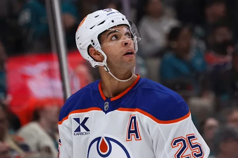Edmonton Oilers defenseman Darnell Nurse (25) looks up.