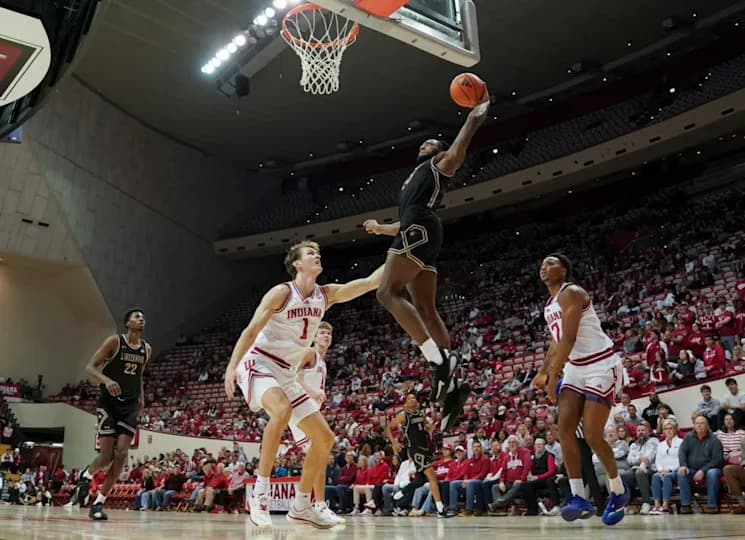 Lindenwood Lions guard Jadis Jones (10) dunks the ball past Indiana Hoosiers forward Reed Bailey (1) during the second half at Simon Skjodt Assembly Hall.