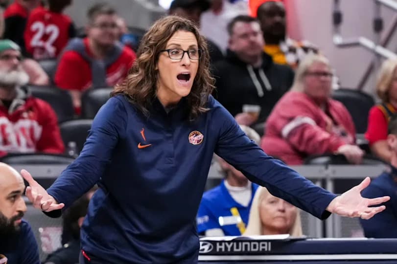 Indiana Fever head coach Stephanie White calls out to her team Thursday, April 30, 2026, during the first half of a preseason game between the Indiana Fever and the Dallas Wings at Gainbridge Fieldhouse in Indianapolis.