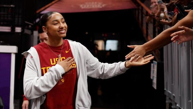 JuJu Watkins high five fan