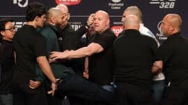 WATCH: Khamzat Chimaev kicks Sean Strickland during chaotic face off at UFC 328 press conference